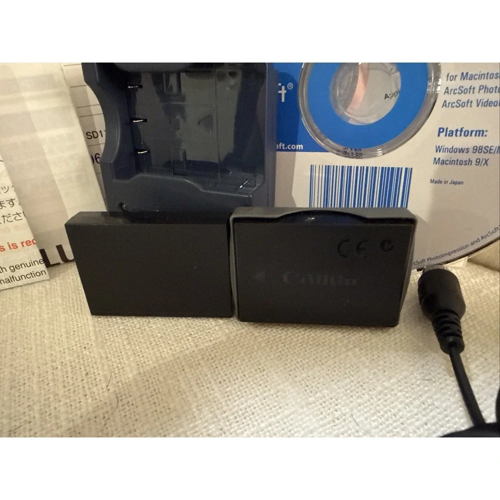 2 - Canon PowerShot SD110 Digital ELPH Camera W OEM Charger‎ - For Parts READ